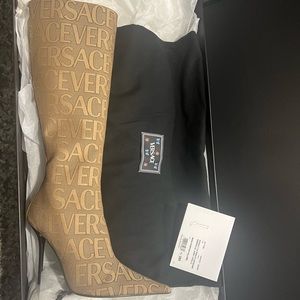 Versace All over Knee high boots.